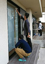 Volunteers busy cleaning windows
