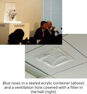 Blue roses in a sealed acrylic container (above) and a ventilation hole covered with a filter in the hall (right)